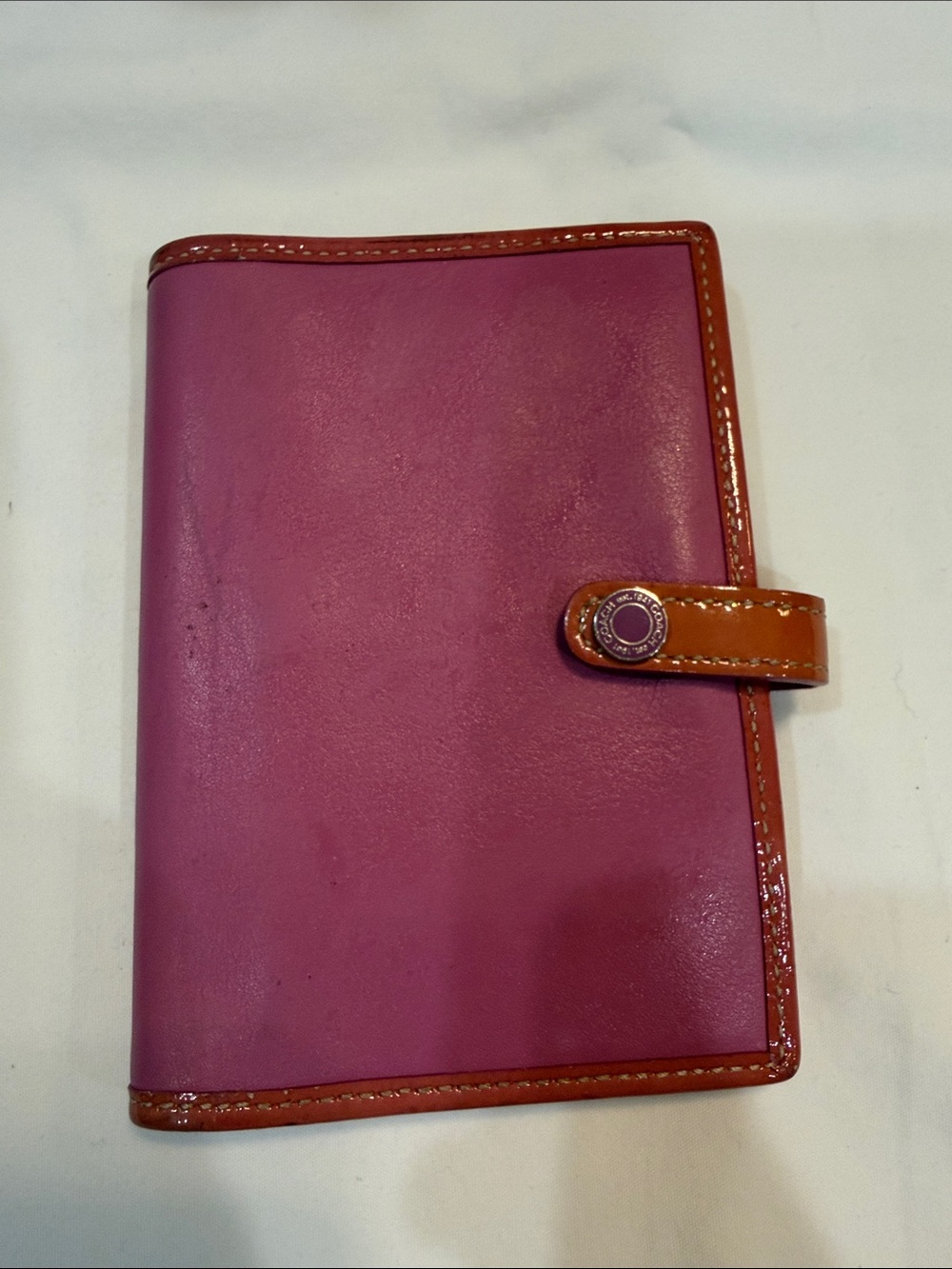 Vintage pink leather coach planner cover